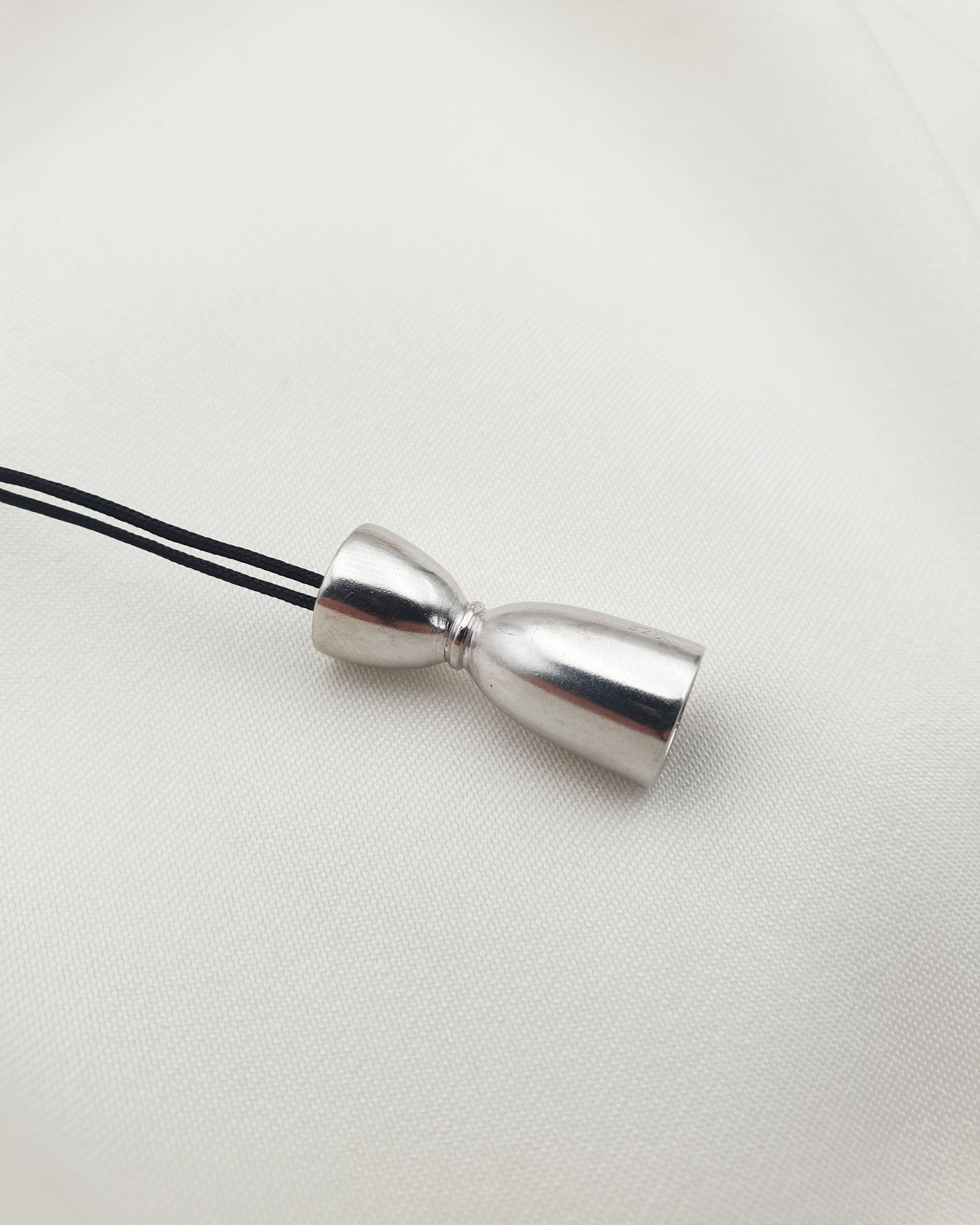 BELL JIGGER NECKLACE