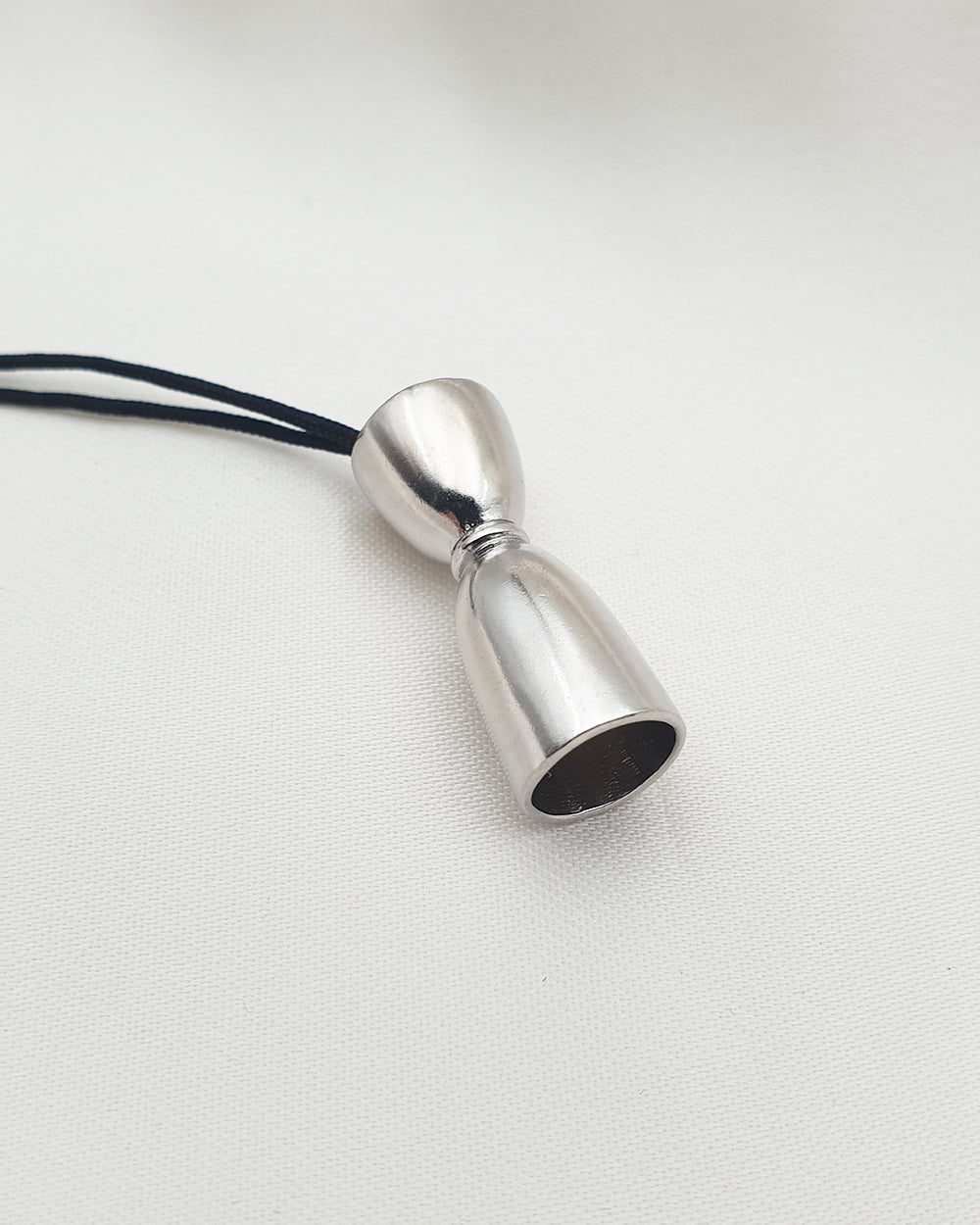 BELL JIGGER NECKLACE