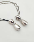 BELL JIGGER NECKLACE