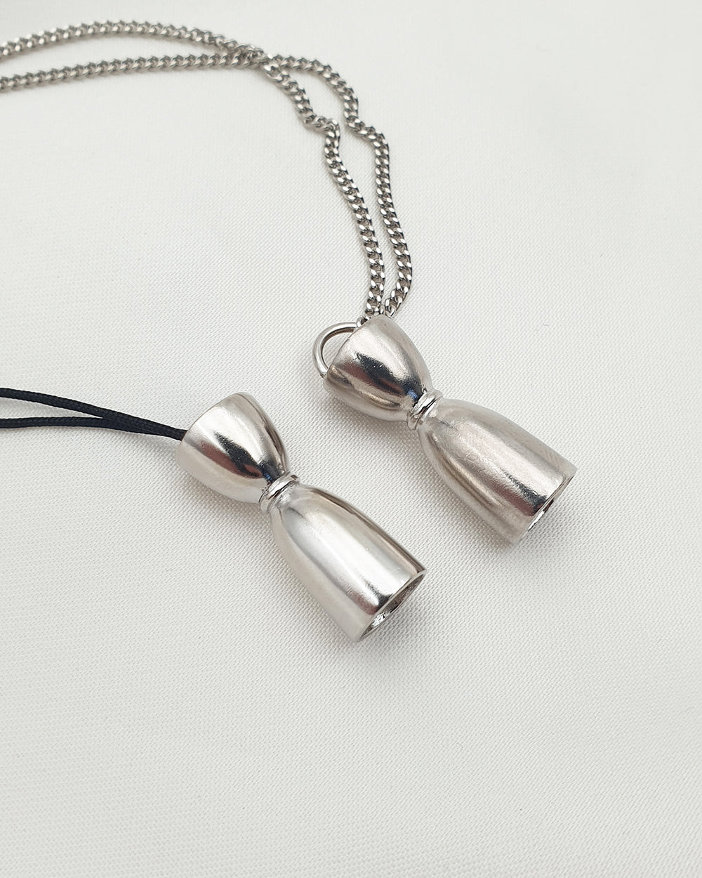 BELL JIGGER NECKLACE